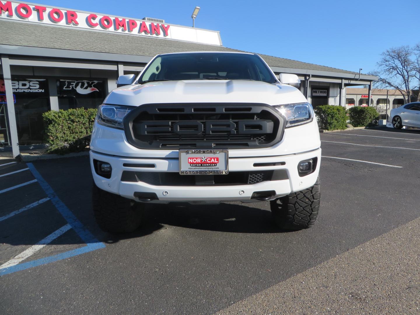 2019 White /Black Ford Ranger Lariat (1FTER4FHXKL) with an 2.3L engine, automatic transmission, located at 2630 Grass Valley Highway, Auburn, CA, 95603, (530) 508-5100, 38.937893, -121.095482 - Features a Fabtech suspension system, Fuel Offroad wheels, Nitto Ridge Grappler tires, Westin Running boards, and a Bakflip. - Photo#1